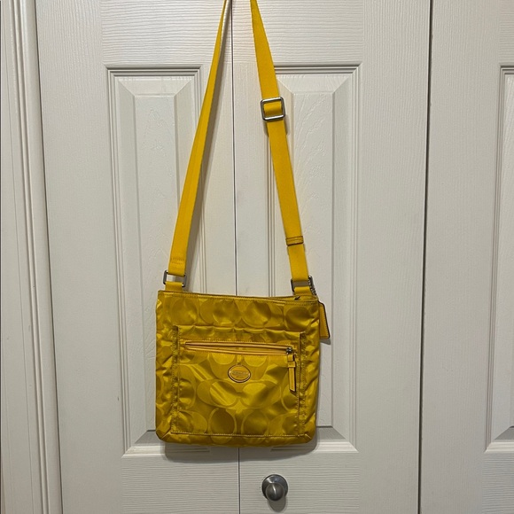 Coach Handbags - Coach Yellow Crossbody Bag. Never been used